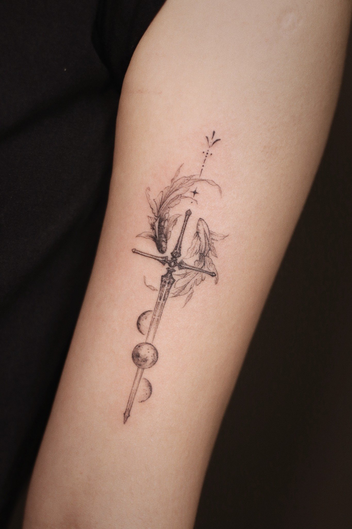 Fine-line koi sword and moon tattoo at Overthink-Ink Saigon