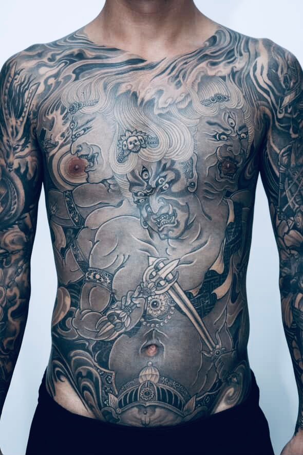 Black and grey back tattoo by Thuong Nguyen at Overthink-Ink Saigon