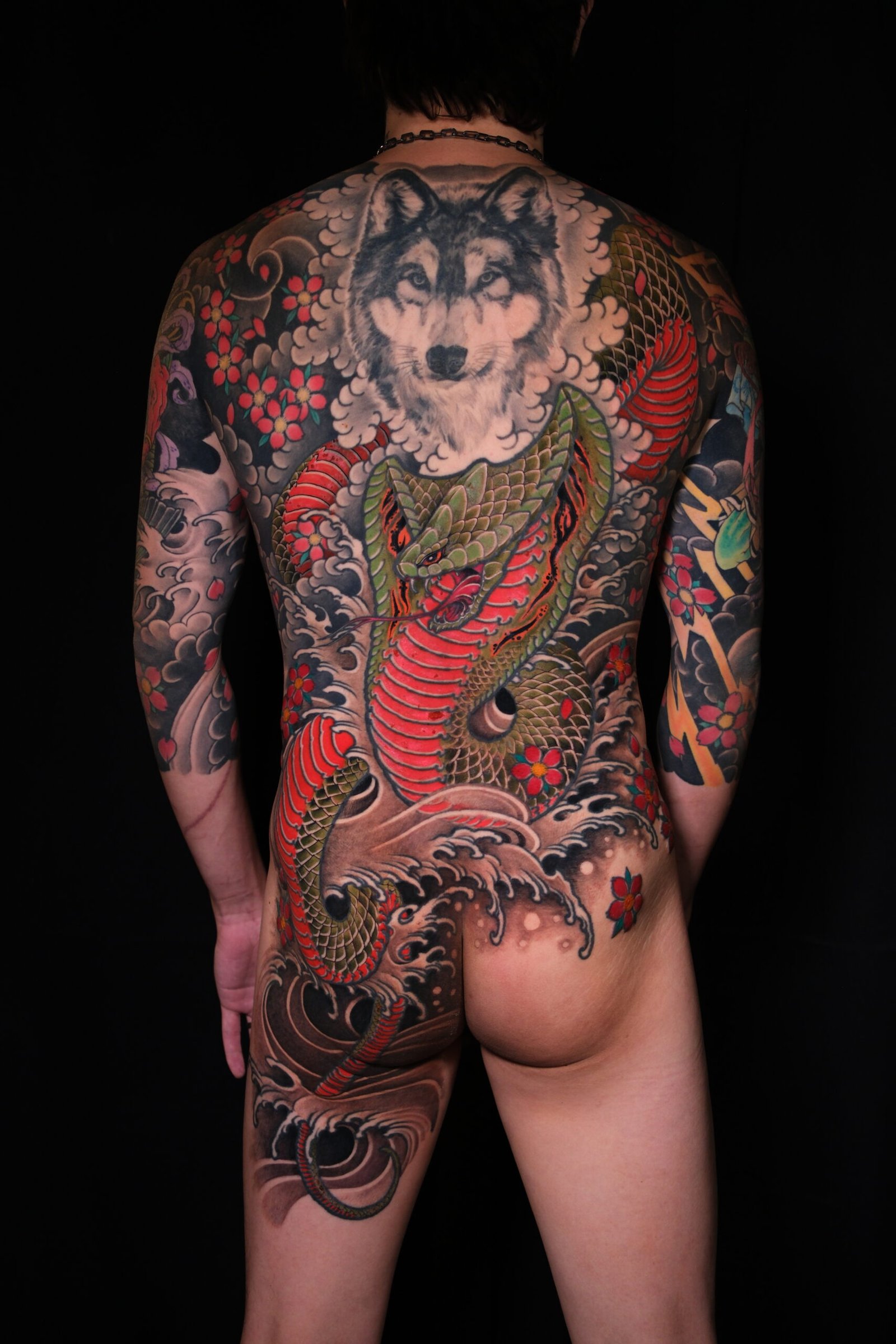 Red and black Japanese back tattoo by Thuong Nguyen at Overthink-Ink Saigon