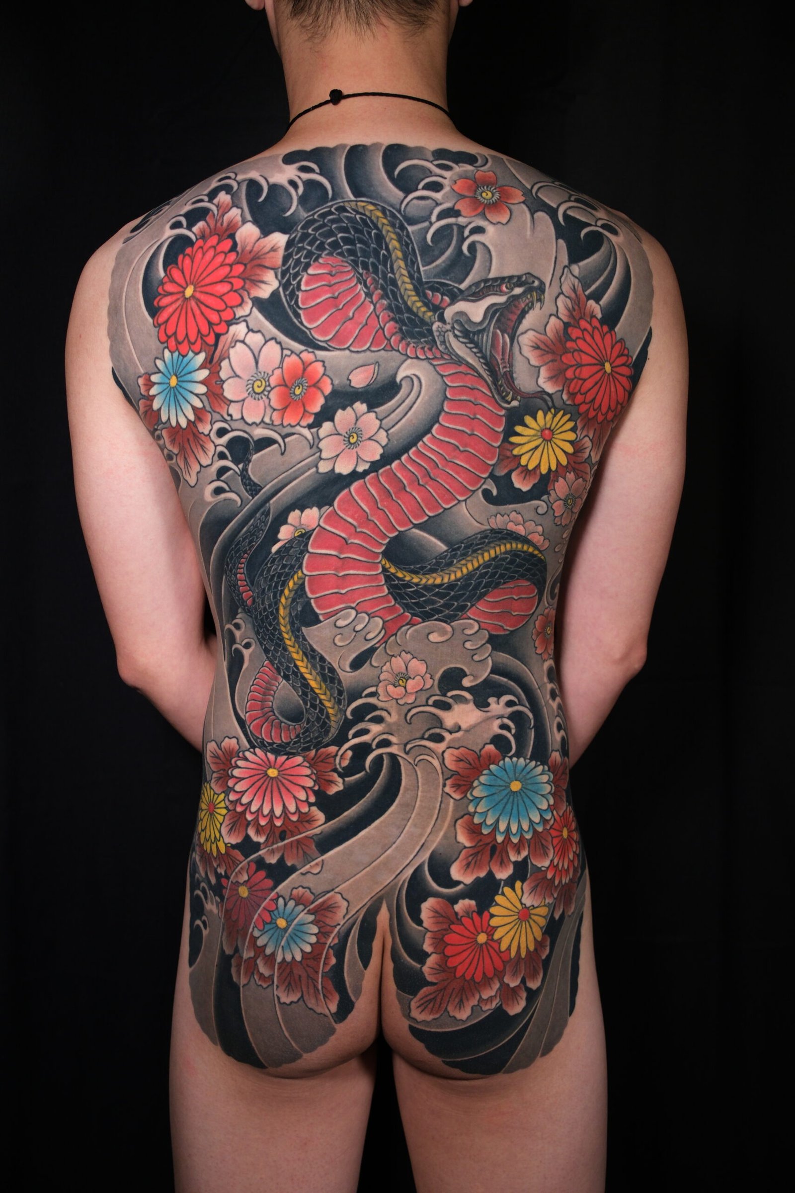 Large color back tattoo by Thuong Nguyen at Overthink-Ink Saigon